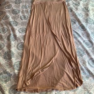 Woman light brown long skirt